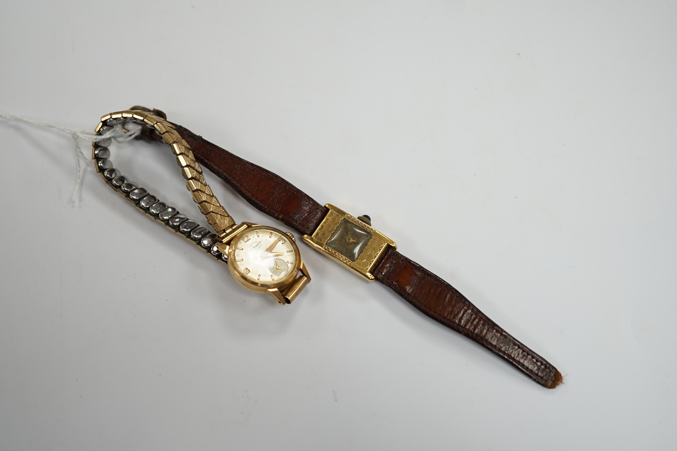 Two 18k cased lady's manual wind wrist watches, including Kismet, on gold plated or leather bracelets.